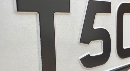 single color shade of number plate black font